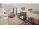Bright Bedroom featuring a wooden crib, comfortable recliner, and charming decor for a cozy atmosphere at 4281 Chimney Lake Ne Dr, Roswell, GA 30075