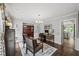 Charming office area with hardwood floors and built-in shelving for storage and style at 4281 Chimney Lake Ne Dr, Roswell, GA 30075