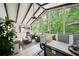 Bright and airy sunroom with a ceiling fan and backyard views at 4281 Chimney Lake Ne Dr, Roswell, GA 30075