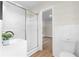 Bright bathroom featuring a shower and a white toilet at 4356 Executive Dr, Stone Mountain, GA 30083