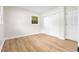 Bedroom featuring a closet with sliding doors and hardwood floors at 4356 Executive Dr, Stone Mountain, GA 30083