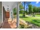 Charming front porch with white columns and a view of the neighborhood at 4356 Executive Dr, Stone Mountain, GA 30083