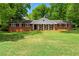 Beautiful brick home with a large front yard and a classic, timeless design at 4356 Executive Dr, Stone Mountain, GA 30083