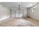 A clean and spacious garage with a white door, perfect for parking and storage at 4356 Executive Dr, Stone Mountain, GA 30083