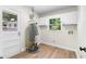 Functional laundry room featuring modern appliances and ample natural light at 4356 Executive Dr, Stone Mountain, GA 30083