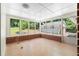 Enclosed sunroom with brick accents and multiple windows offering natural light at 4356 Executive Dr, Stone Mountain, GA 30083