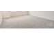 A spacious bedroom with neutral carpeting and plenty of natural light at 8491 Limerick Ln, Winston, GA 30187