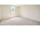 Bright bedroom with a large window and cozy carpeting at 8491 Limerick Ln, Winston, GA 30187