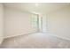 Bright bedroom with neutral carpet and fresh paint awaits personal touches to make it your own at 8491 Limerick Ln, Winston, GA 30187