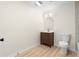 This bathroom boasts a wood vanity, and modern lighting, creating a serene atmosphere at 223 Old Alabama Se Rd, Emerson, GA 30137