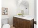 Bathroom with a sink, vanity, framed mirror, and modern lighting at 223 Old Alabama Se Rd, Emerson, GA 30137