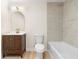 This bathroom boasts a wood vanity, and modern lighting, creating a serene atmosphere at 223 Old Alabama Se Rd, Emerson, GA 30137