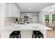 Bright, modern kitchen featuring stainless steel appliances and stone countertops at 223 Old Alabama Se Rd, Emerson, GA 30137