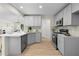 Open kitchen layout with stainless steel appliances and breakfast bar seating at 223 Old Alabama Se Rd, Emerson, GA 30137