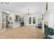Open-concept living room with modern lighting, a fireplace, and hardwood floors at 223 Old Alabama Se Rd, Emerson, GA 30137