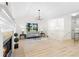 Inviting living room featuring a fireplace, hardwood floors, and natural light at 223 Old Alabama Se Rd, Emerson, GA 30137
