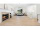 Bright living room with fireplace, large windows, and hardwood floors at 223 Old Alabama Se Rd, Emerson, GA 30137