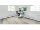 Bright home office features light gray walls and two sunny windows at 2342 Eastway Rd, Decatur, GA 30033