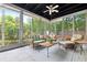 Relaxing sunroom with ample natural light and comfortable seating for outdoor enjoyment at 2342 Eastway Rd, Decatur, GA 30033