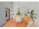 Bright dining room with vaulted ceilings and hardwood floors at 4514 Creekwood Nw Cir, Kennesaw, GA 30152