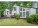 Front exterior view of a two-story house with updated siding and landscaping at 4514 Creekwood Nw Cir, Kennesaw, GA 30152