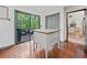 Charming kitchen island with granite top near sliding glass doors to deck at 4514 Creekwood Nw Cir, Kennesaw, GA 30152