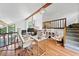 Large and luminous home office with hardwood floors and staircase at 4514 Creekwood Nw Cir, Kennesaw, GA 30152