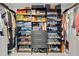 A luxurious walk-in closet with custom shelving, drawers, and ample space for clothing and accessories at 4514 Creekwood Nw Cir, Kennesaw, GA 30152