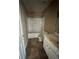 Bathroom with tub-shower combination, toilet, and vanity with white cabinetry at 1466 Dolcetto Nw Trce # 18, Kennesaw, GA 30152