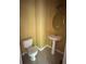 Half-bathroom with a pedestal sink, toilet, neutral paint, and tiled floor at 1466 Dolcetto Nw Trce # 18, Kennesaw, GA 30152