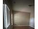 Bright bedroom features natural light, a sloped ceiling, and neutral paint at 1466 Dolcetto Nw Trce # 18, Kennesaw, GA 30152
