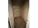Walk-in closet with ample shelving for storage and organization at 1466 Dolcetto Nw Trce # 18, Kennesaw, GA 30152