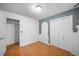 Bedroom with a view to another room, closet, tile flooring, and a painted wall at 1642 Ashmar Sw Ln, Marietta, GA 30064