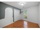 Bedroom with a window, closet, tile flooring, and freshly painted wall at 1642 Ashmar Sw Ln, Marietta, GA 30064