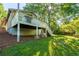 A spacious backyard features a large deck and stairs, perfect for outdoor entertaining and relaxation at 1761 Flat Shoals Se Rd, Atlanta, GA 30316