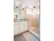 Bright bathroom features marble counters and large glass walk-in shower at 1761 Flat Shoals Se Rd, Atlanta, GA 30316