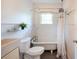 Classic bathroom with clawfoot tub, toilet, and farmhouse style sink at 1761 Flat Shoals Se Rd, Atlanta, GA 30316