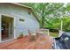 View of deck, patio doors, and outdoor seating at 1761 Flat Shoals Se Rd, Atlanta, GA 30316