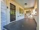 Welcoming front porch featuring stone accents, offering a relaxing spot with natural light and protection from the elements at 1761 Flat Shoals Se Rd, Atlanta, GA 30316