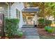 Inviting front porch with stone accents, offering a glimpse of outdoor seating for relaxation at 1761 Flat Shoals Se Rd, Atlanta, GA 30316
