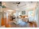 Cozy living room with hardwood floors, tray ceilings and large windows at 1761 Flat Shoals Se Rd, Atlanta, GA 30316