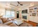 Comfortable living room with ceiling fan and fireplace at 1761 Flat Shoals Se Rd, Atlanta, GA 30316