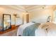 This main bedroom is spacious, with natural light and hardwood flooring at 1761 Flat Shoals Se Rd, Atlanta, GA 30316