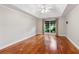 Large bedroom with tray ceiling, hardwood floors, and ample natural light at 2437 Camden Lake Nw Vw, Acworth, GA 30101