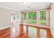 Bright dining room with hardwood floors and a view of the backyard at 2437 Camden Lake Nw Vw, Acworth, GA 30101
