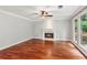 Spacious living room with hardwood floors and a fireplace at 2437 Camden Lake Nw Vw, Acworth, GA 30101