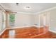 Cozy living room with hardwood floors and natural light at 2437 Camden Lake Nw Vw, Acworth, GA 30101