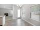 Bright dining area featuring ample natural light and a seamless transition to the kitchen at 458 Ajo Way, Dallas, GA 30157