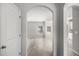 Light and airy entryway with wood floors and modern archways at 458 Ajo Way, Dallas, GA 30157