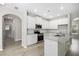 Modern kitchen with white cabinetry, granite countertops, and stainless steel appliances at 458 Ajo Way, Dallas, GA 30157